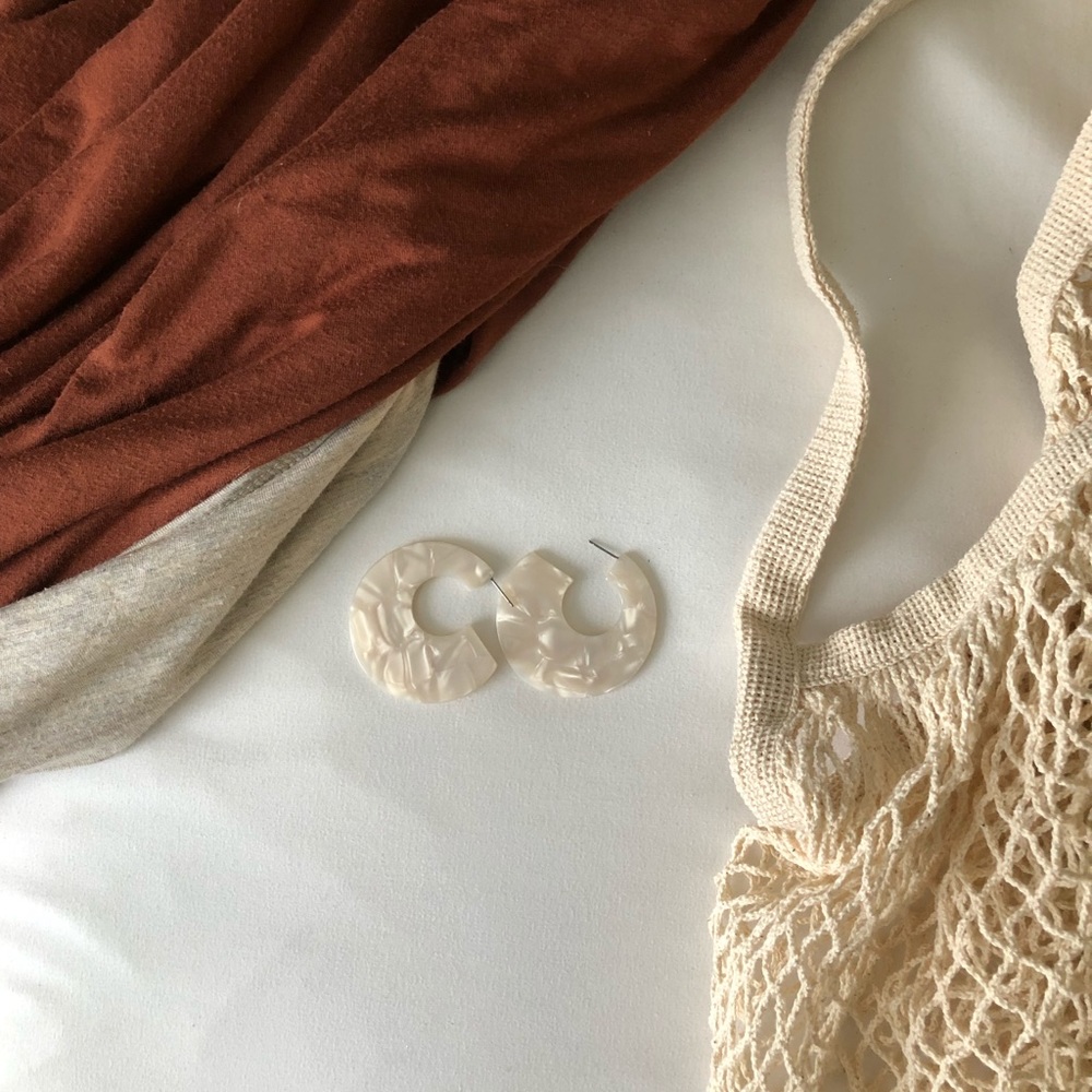 white acrylic risen earrings